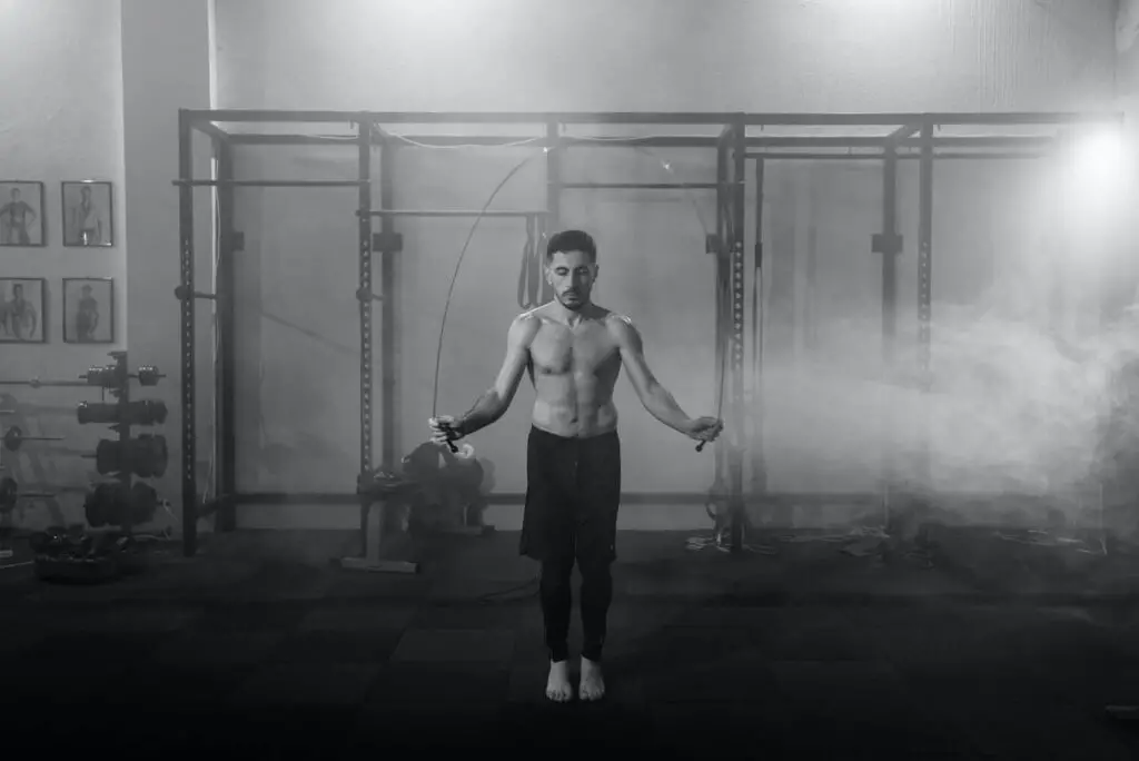 are hiit workouts good for ectomorphs: shirtless man working out using jump rope