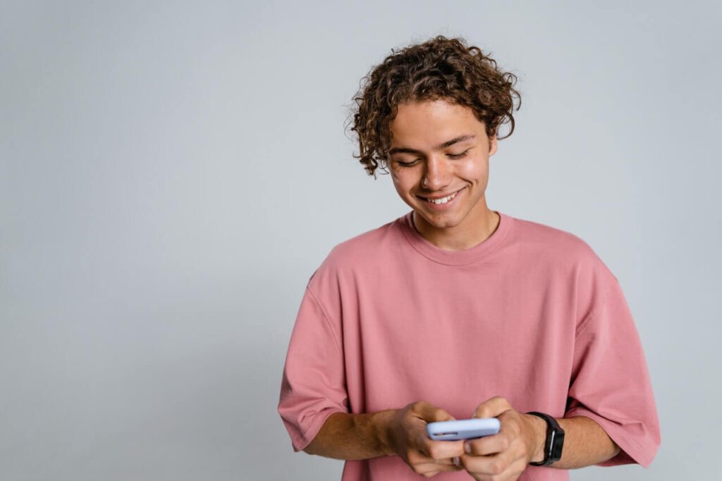 skinny guy wearing light pink