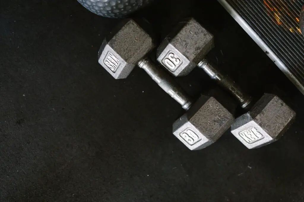 close-up photo of two heavy dumbbells