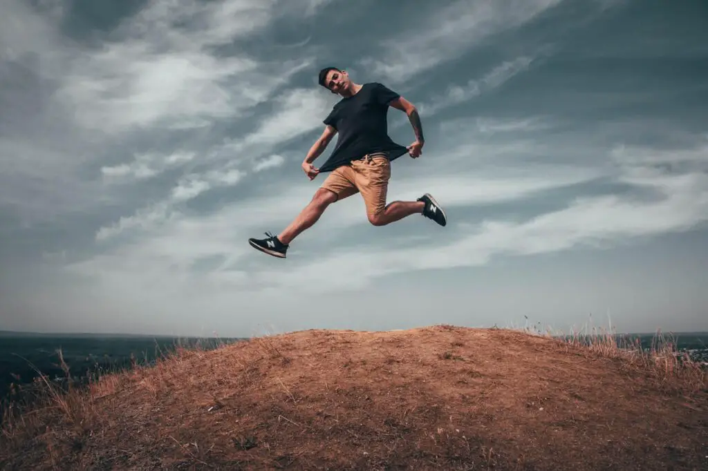 skinny guy jumping