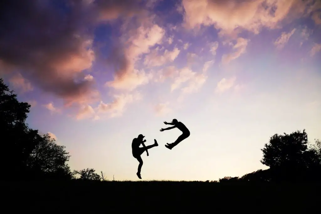 2 people practicing martial arts